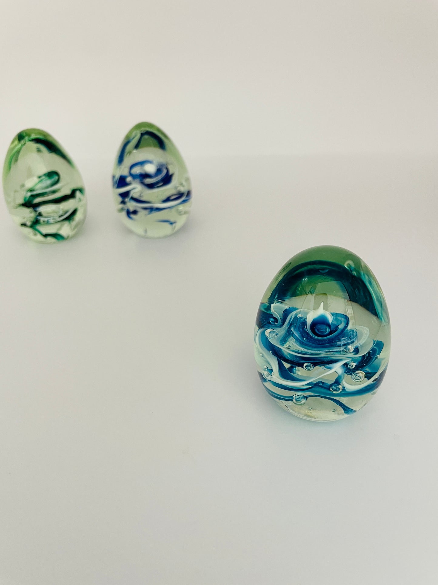 Glass egg paperweight
