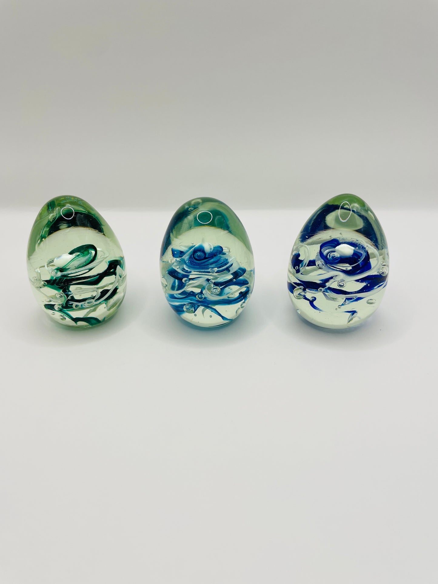 Glass egg paperweight