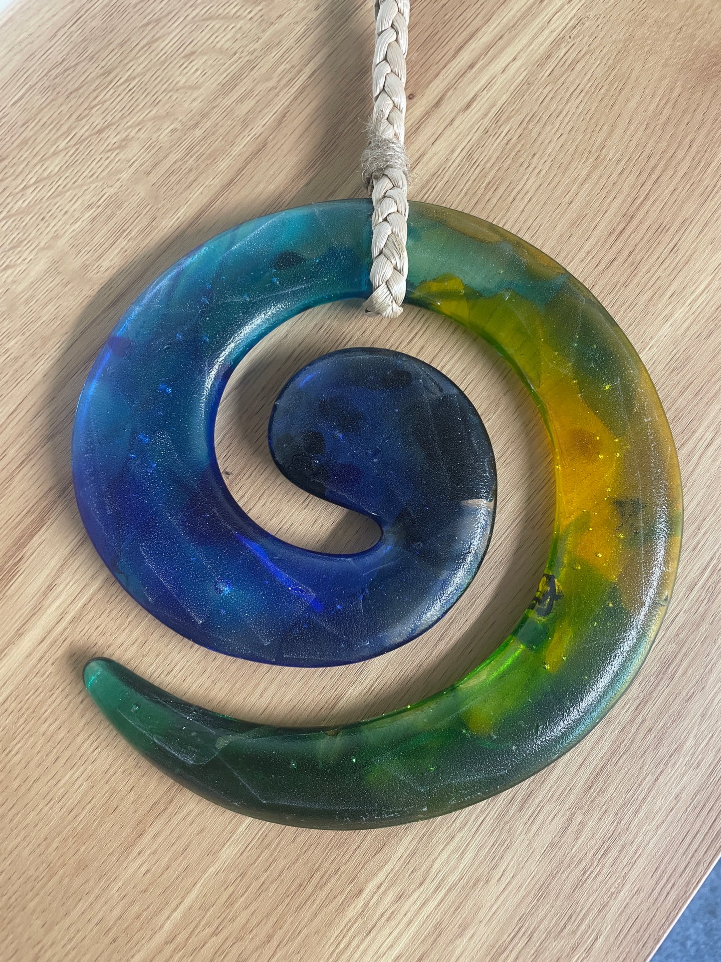 Hanging Glass Koru by Roz Spiers