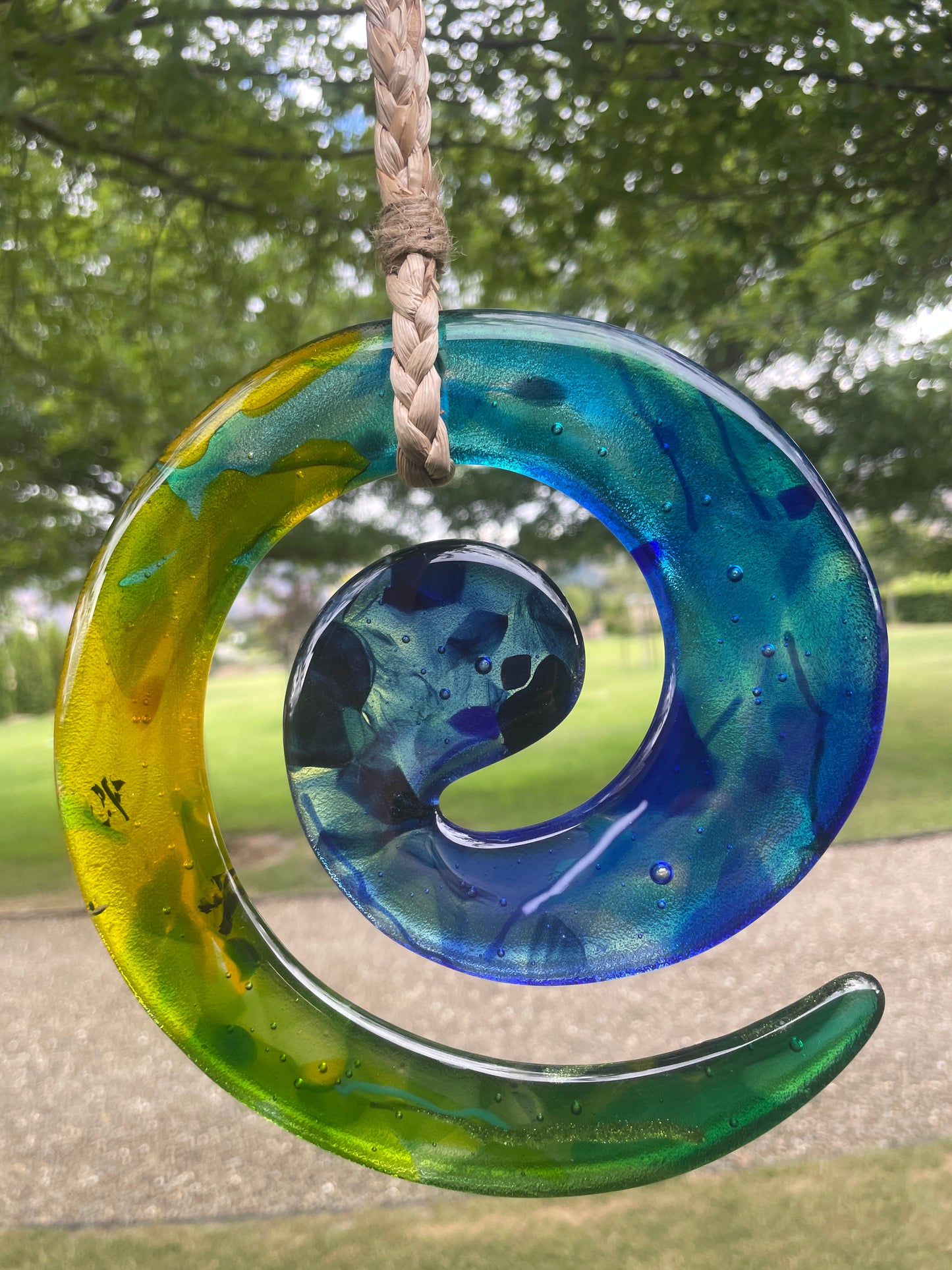 Hanging Glass Koru by Roz Spiers