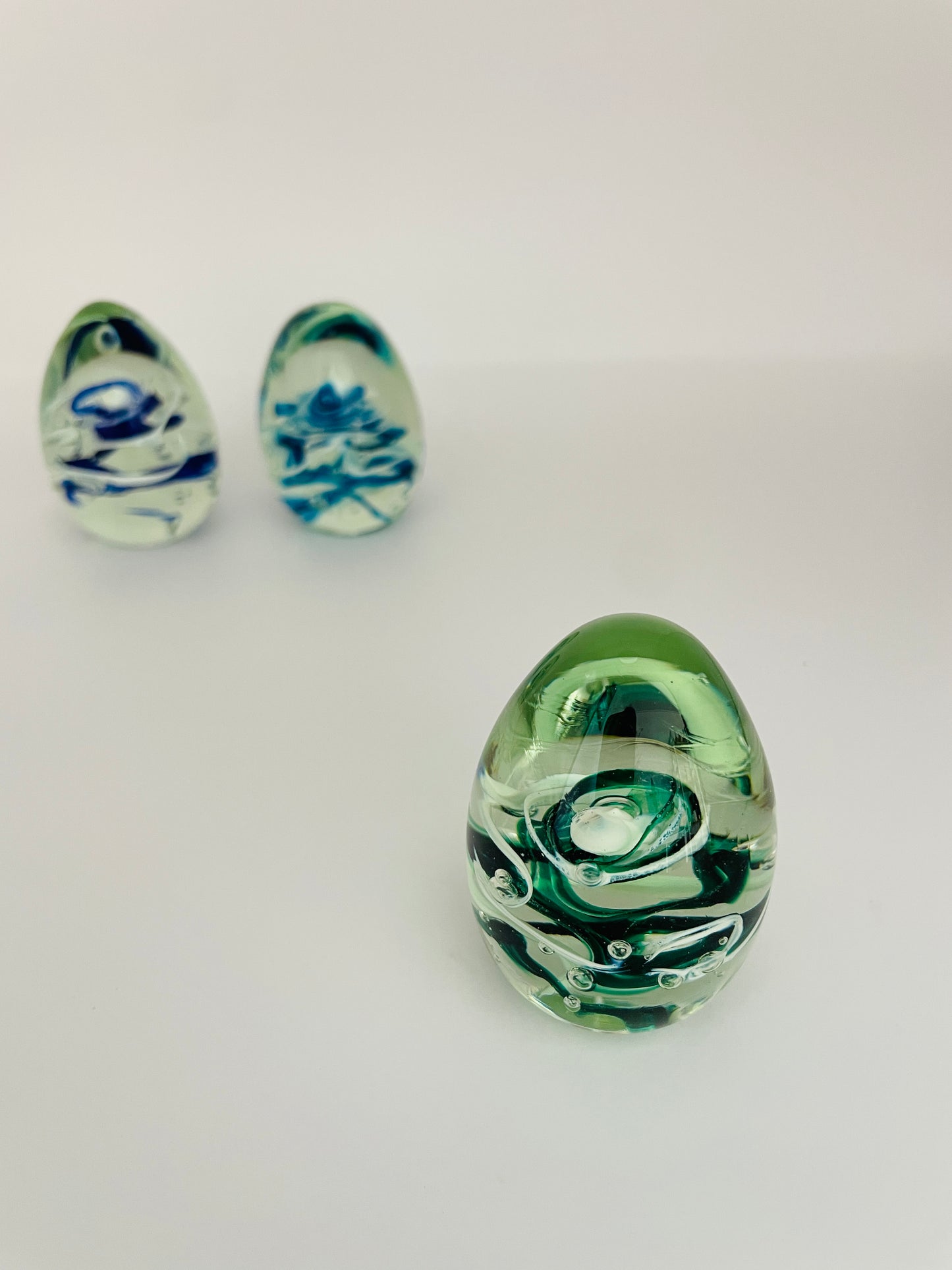 Glass egg paperweight