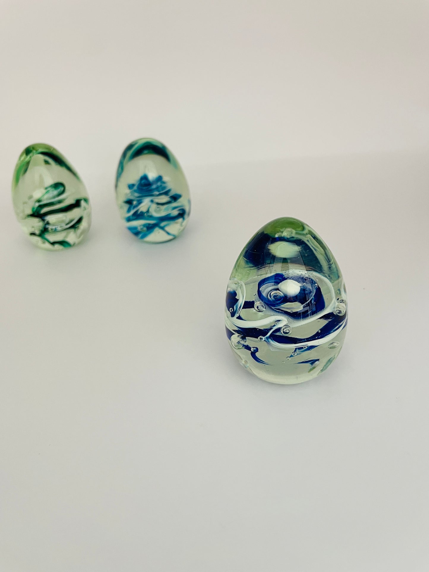 Glass egg paperweight